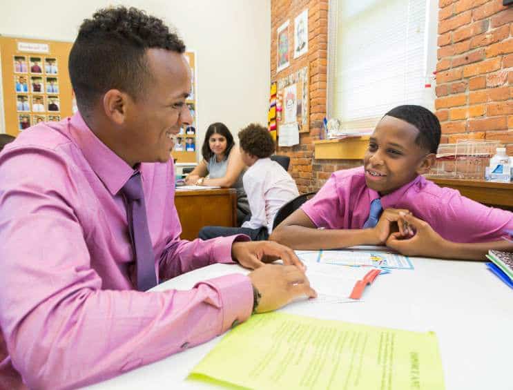 Patrick Farmer teaching sixth graders at Nativity Preparatory School